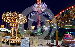 The night the carousel in Christmas town. Russia, Ulyanovsk region, Dimitrovgrad 30 December 2016.