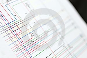 Colorful cars electric wiring scheme on paper sheet
