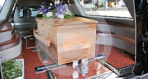 Colorful casket in a hearse or chapel before funeral or burial at cemetery