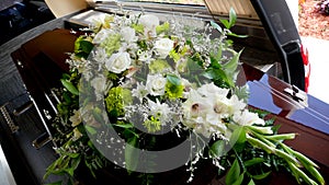 a colorful casket in a hearse or church before funeral