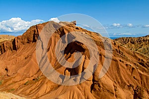 Colorful castle shape mountains, yellow and different color painted hills