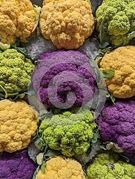 Colorful cauliflowers inside a supermarket