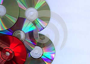 Colorful CDs against a White Background