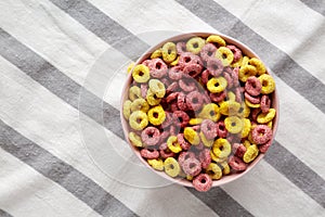 Colorful Cereal Loops with Whole Milk for Breakfast. Flat lay, overhead, from above. Copy space