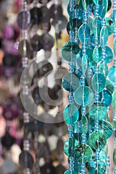 Colorful chains of plastic discs for room decoration