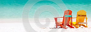 Colorful chairs on Caribbean beach photo