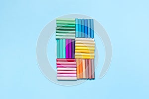 Colorful chalk crayons for drawing on a blackboard and on asphalt