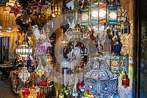 Colorful chandeliers for sale in a market in a souk in the Medina around the Jemaa el-Fnaa square in Marrakesh Morocco