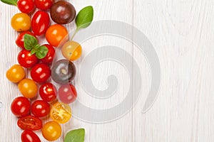 Colorful cherry tomatoes and basil