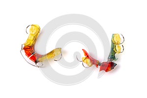 Colorful children`s orthodontic appliances isolated on white background. Concept of oral health in childhood