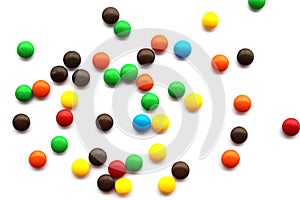 Colorful chocolate candies on white background, small candy mix