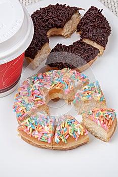 Colorful and chocolate Donut with coffee in vertical