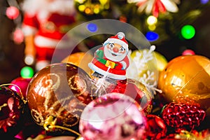 Colorful christmas balls tree and santa decorations background photo