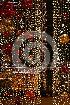 Colorful christmas Decoration. Winter holidays and traditional ornaments. Lighting chains-bulbs for seasonal background.