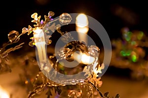 Colorful Christmas lights as multi colored chain of lights for a happy new year and holy eve as festive decoration and ornament fo