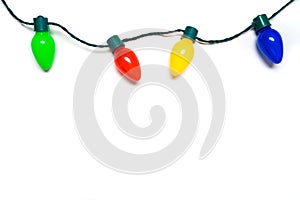 Colorful Christmas lights on a white background