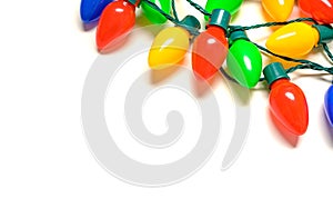 Colorful Christmas lights on a white background