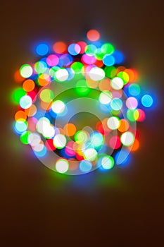 Colorful Christmas lights wreath bokeh