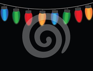 Colorful Christmas String Lights on a Black Background With Space for Text