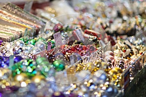 Colorful christmas tree ornaments and balls, advent market stall close up, photo