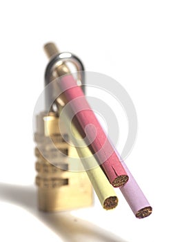 Colorful cigarettes and a padlock.Tobacco addiction concept.