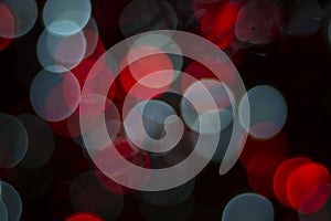 Colorful circles of blue and red lights bokeh abstract background