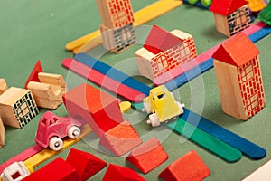 Colorful city toys cars aeroplanes houses