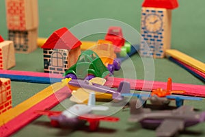 Colorful city toys cars aeroplanes houses