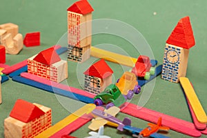 Colorful city toys cars aeroplanes houses