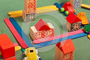 Colorful city toys cars aeroplanes houses