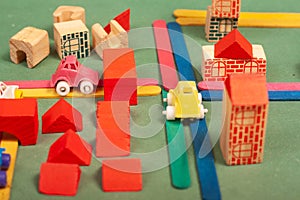 Colorful city toys cars aeroplanes houses