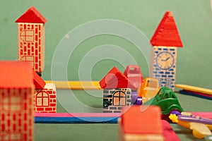 Colorful city toys cars aeroplanes houses