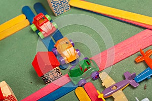 Colorful city toys cars aeroplanes houses