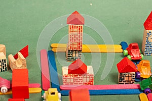 Colorful city toys cars aeroplanes houses photo