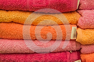 Colorful clean towels soft hygiene at home in bathroom background