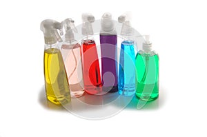 Colorful Cleaning Bottles on White