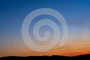 Colorful clear sky with no clouds at dusk after sunset