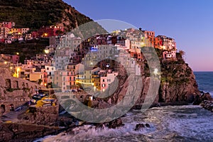 Colorful cliffside houses in Maranola, Cinque Terre, northern Italy.