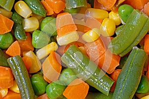 colorful closeup mixed frozen vegetables as side dish for a dinner or supper