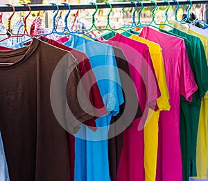 Colorful clothes drying on washing line.