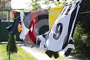 Colorful clothes hanging to dry on a laundry line