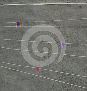 Colorful clothes pegs on the wires