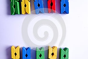 Colorful clothespins isolated on a white background