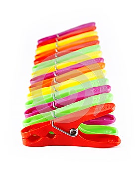 Colorful clothespins in a row