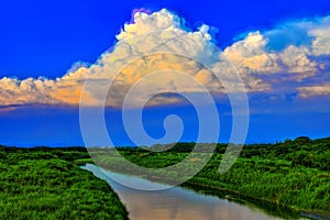 The colorful cloud and meandering river