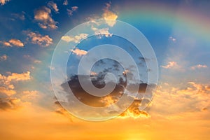 Colorful Clouds, Sun Rays and Rainbow in The Sky at Sunset for Background