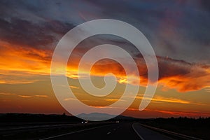 Colorful cloudy evening sky illuminates the newly constructed highway in Croatia