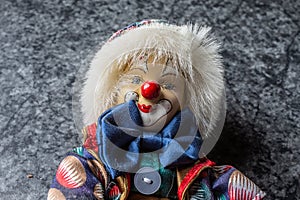 Colorful clown as a doll