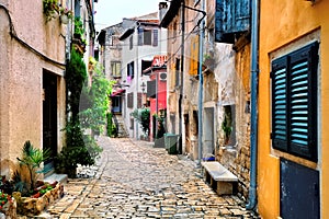 Colorful cobblestone street in the Old Town of Rovijn, Croatia