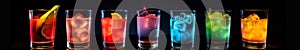 Colorful cocktails with fruits on black background